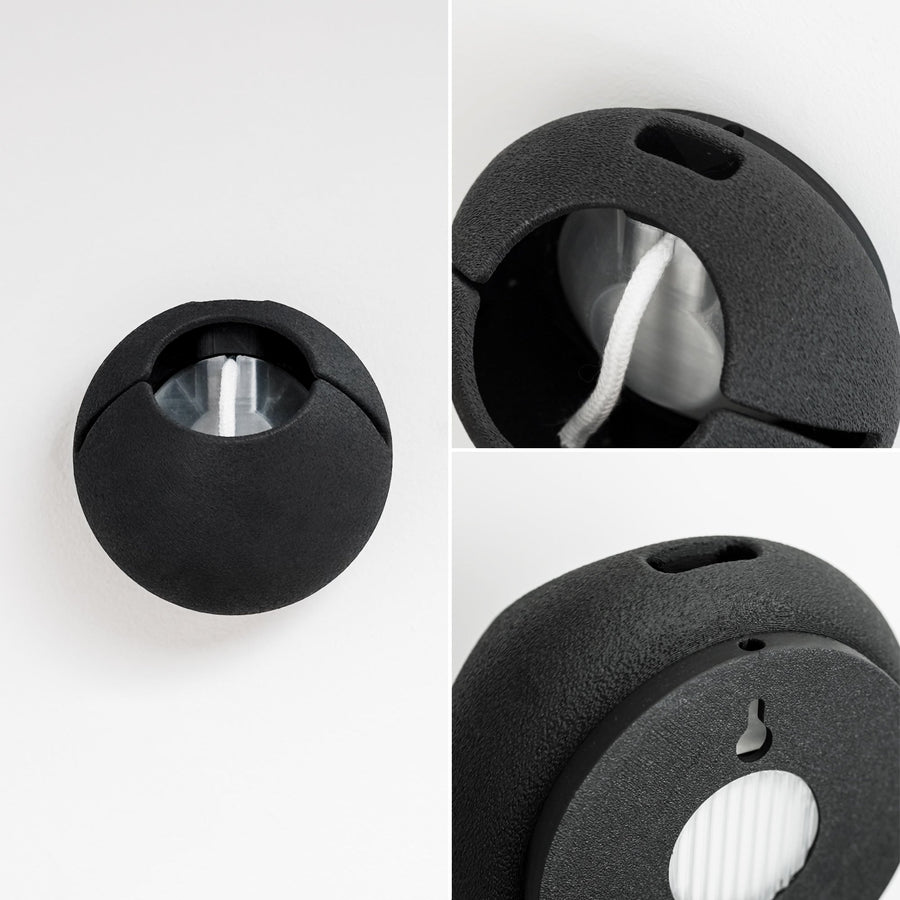 Cloud wall planter interior with a white wick, side ventilation slots and rear mounting keyhole.