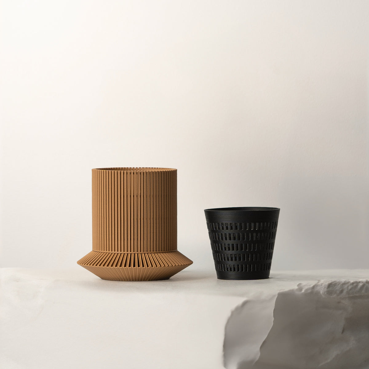 Brown VerdiPot Koshido self-watering planter with its removable black air-pruning inner pot.