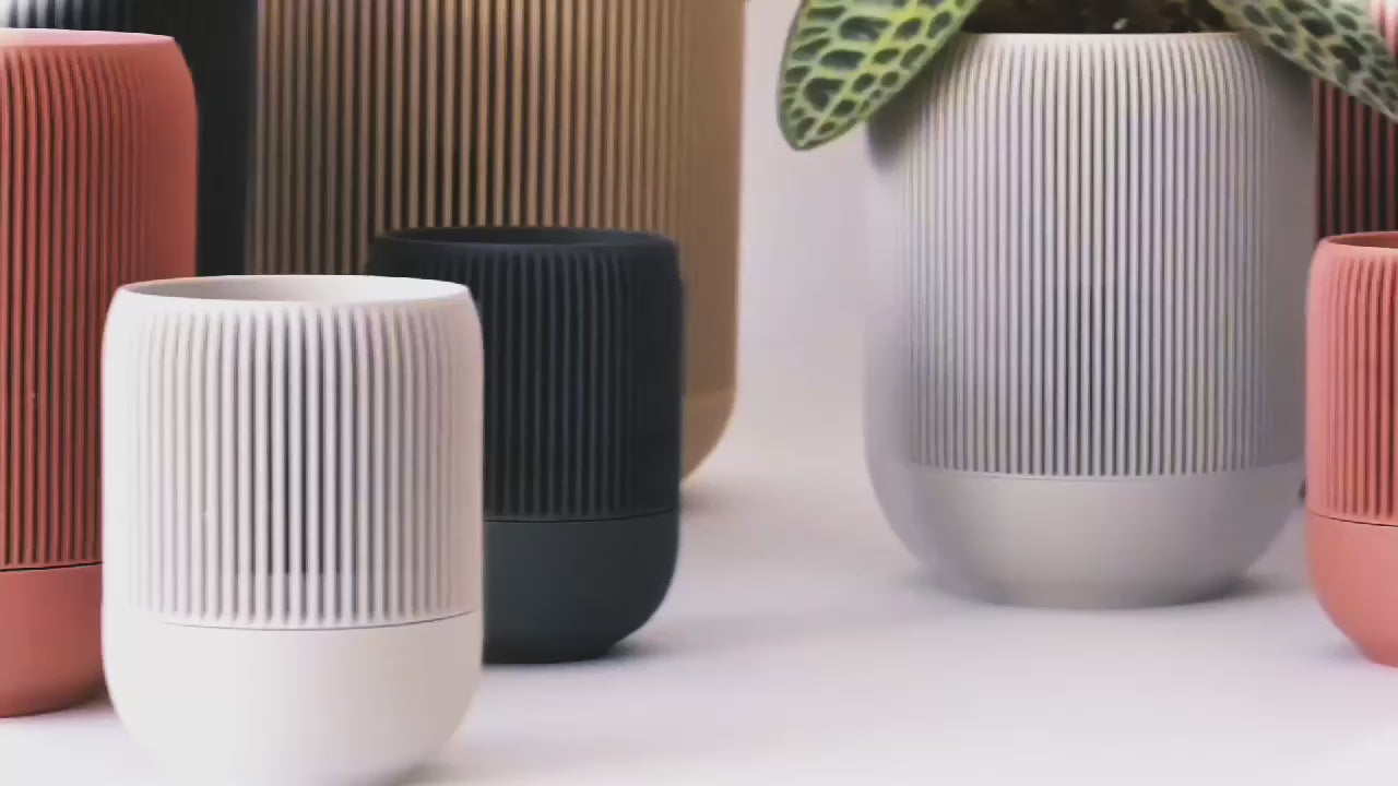 Ribbed Lina planters in several colors.